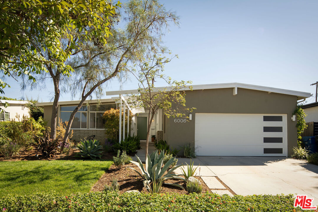6006 Babbitt Avenue Encino, CA 91316 - Photo 2 of 32 a front view of a house with garden