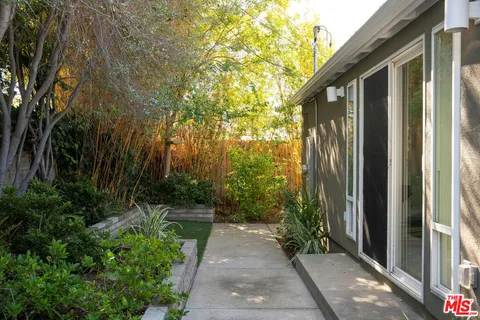 a view of a garden with pathway