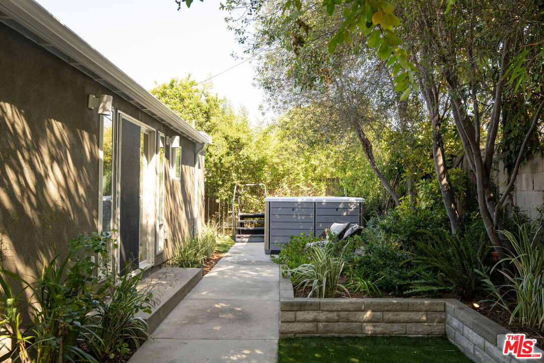 6006 Babbitt Avenue Encino, CA 91316 - Photo 27 of 32 a view of a garden with pathway