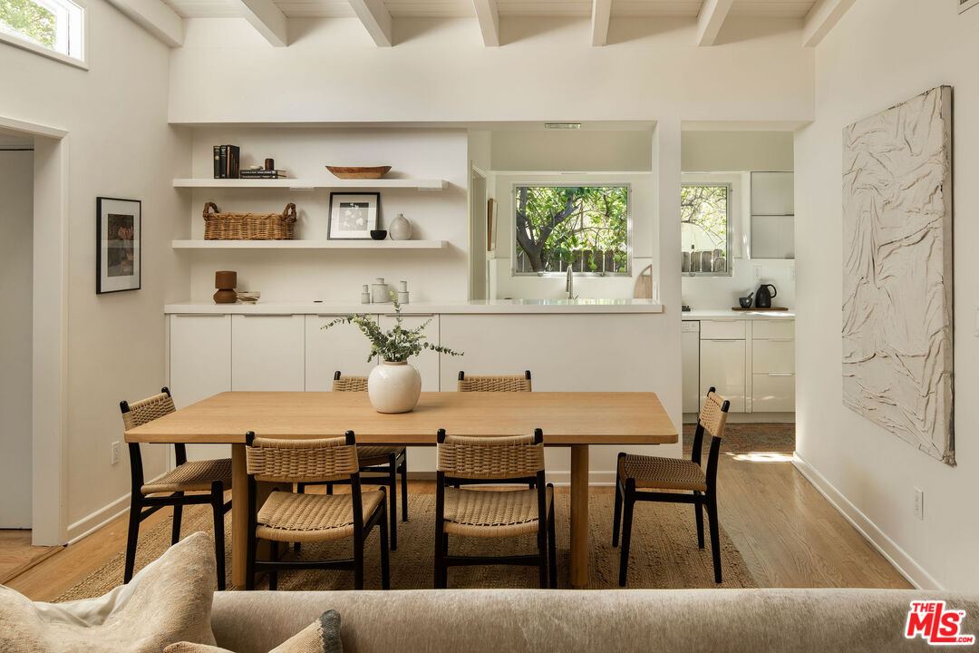 6006 Babbitt Avenue Encino, CA 91316 - Photo 9 of 32 a view of a dining room with furniture and window