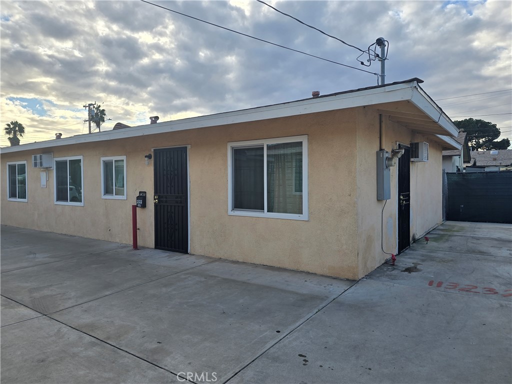 11323 1/2 Schmidt Road El Monte, CA 91733 - Photo 3 of 12 a view of a house with roof