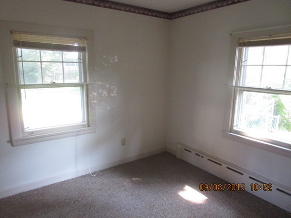 68 Durfee Road Tiverton, RI 02878 - Photo 16 of 22 an empty room with a window