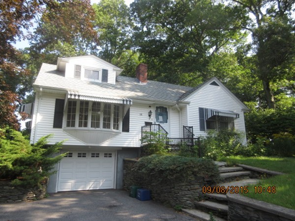 68 Durfee Road Tiverton, RI 02878 - Photo 5 of 22 a front view of a house with garden