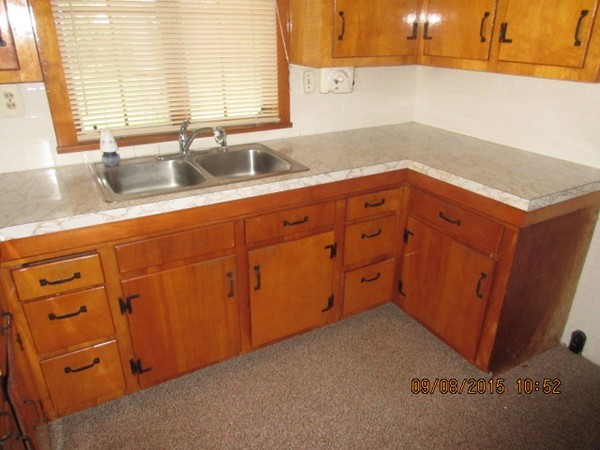 68 Durfee Road Tiverton, RI 02878 - Photo 10 of 22 a kitchen with granite countertop cabinets and window