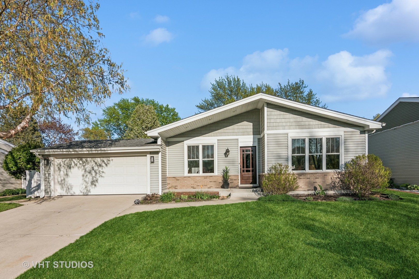 389 Weidner Road Buffalo Grove, IL 60089 - Photo 1 of 25 a view of a house with backyard and garden