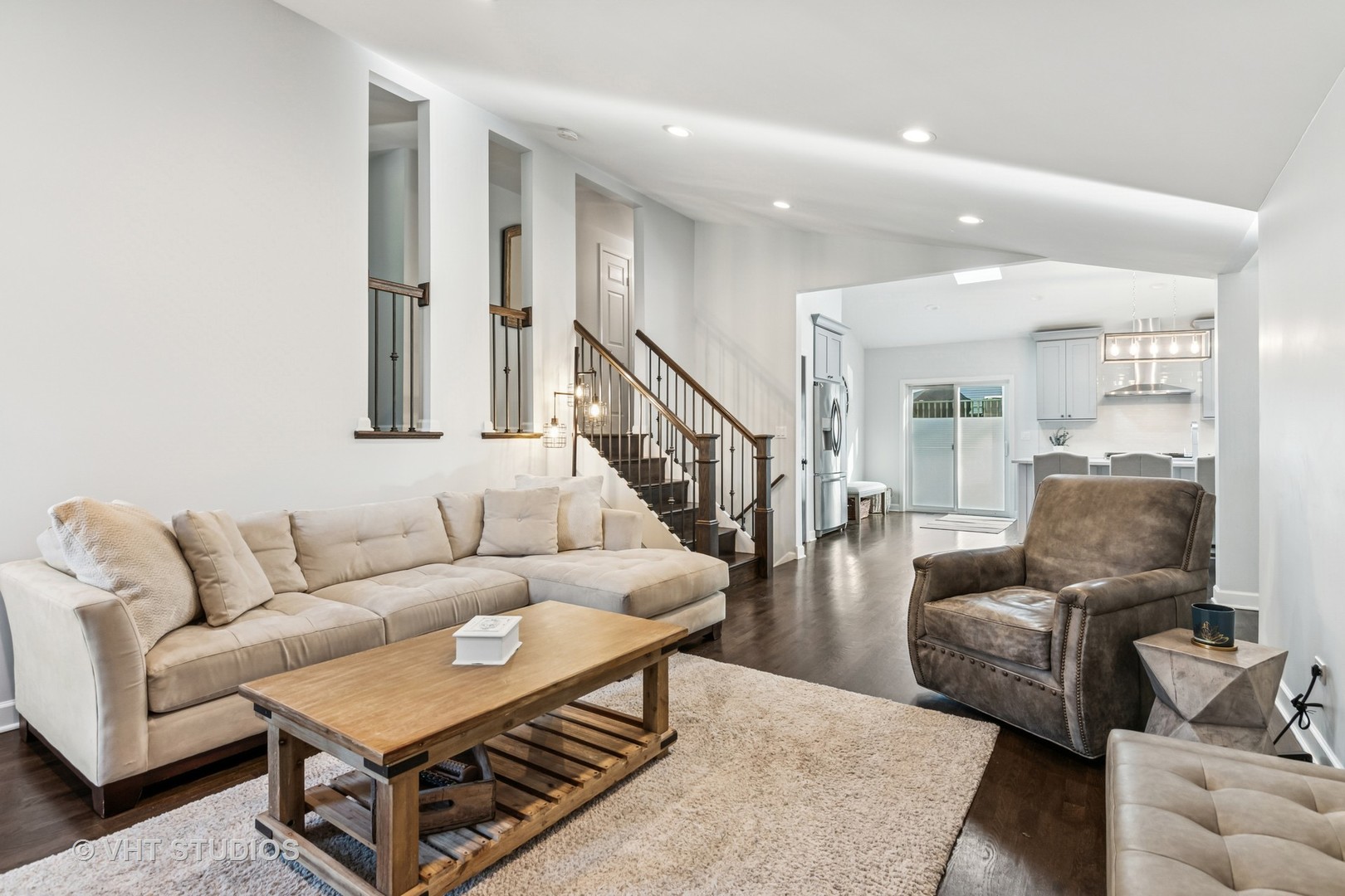 389 Weidner Road Buffalo Grove, IL 60089 - Photo 11 of 25 a living room with furniture and a view of kitchen