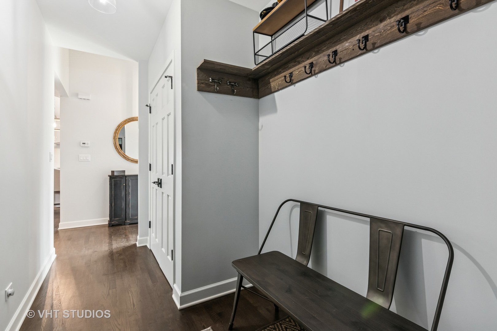 389 Weidner Road Buffalo Grove, IL 60089 - Photo 12 of 25 a view of a hallway with wooden floor and staircase