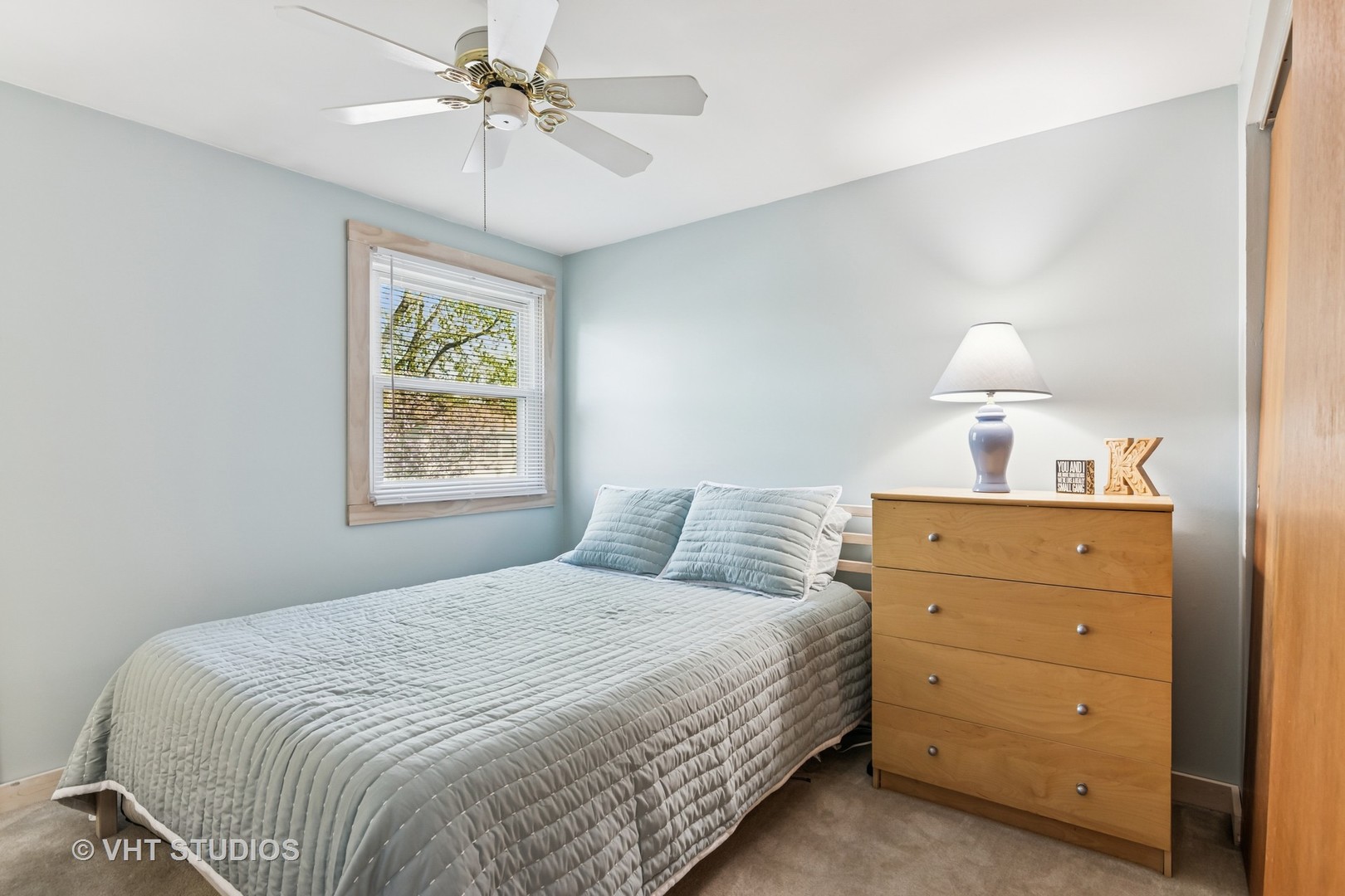 389 Weidner Road Buffalo Grove, IL 60089 - Photo 16 of 25 a bedroom with a bed and a window