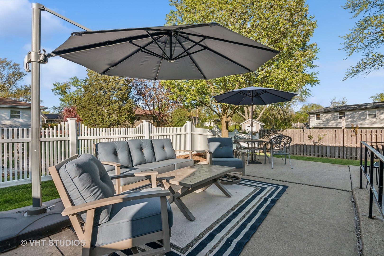 389 Weidner Road Buffalo Grove, IL 60089 - Photo 23 of 25 a view of a patio with furniture and a umbrella