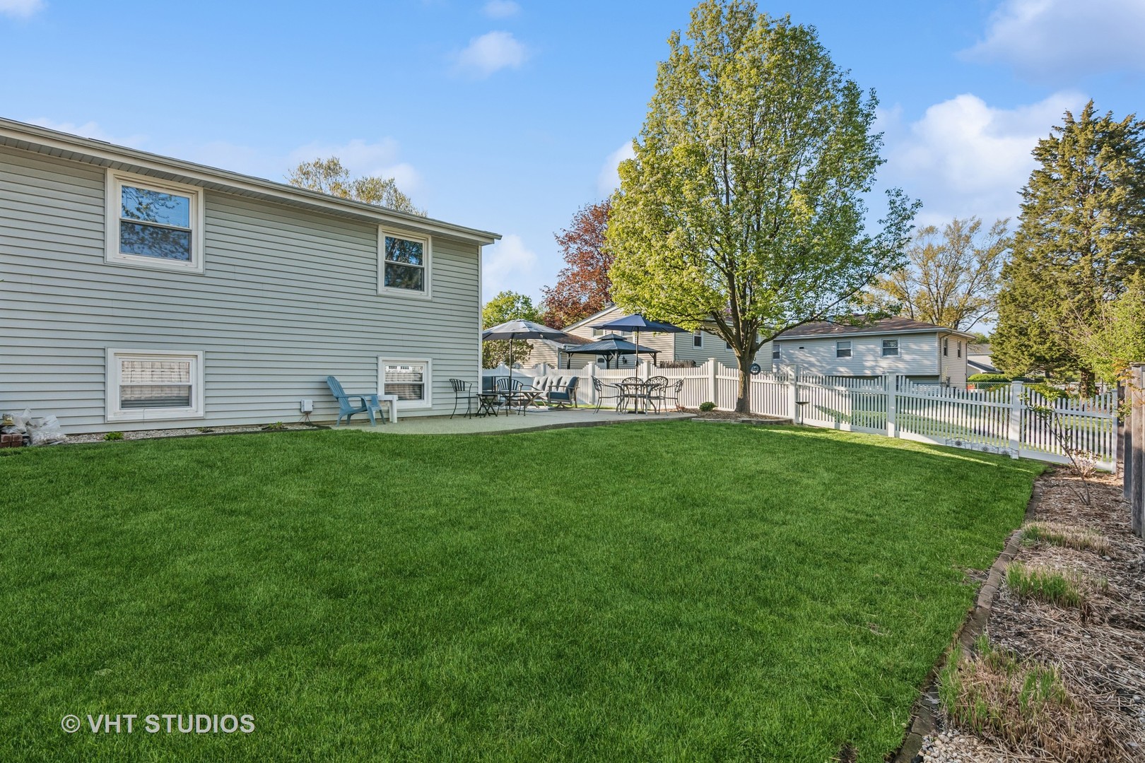 389 Weidner Road Buffalo Grove, IL 60089 - Photo 24 of 25 a view of a house with backyard and sitting area