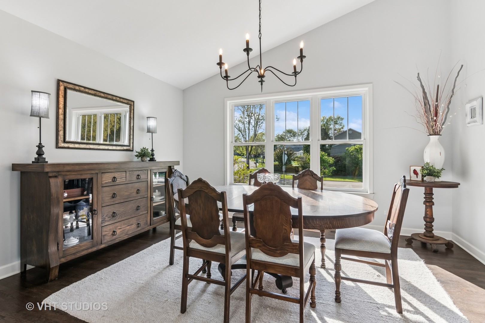 389 Weidner Road Buffalo Grove, IL 60089 - Photo 5 of 25 a view of a dining room with furniture window and wooden floor
