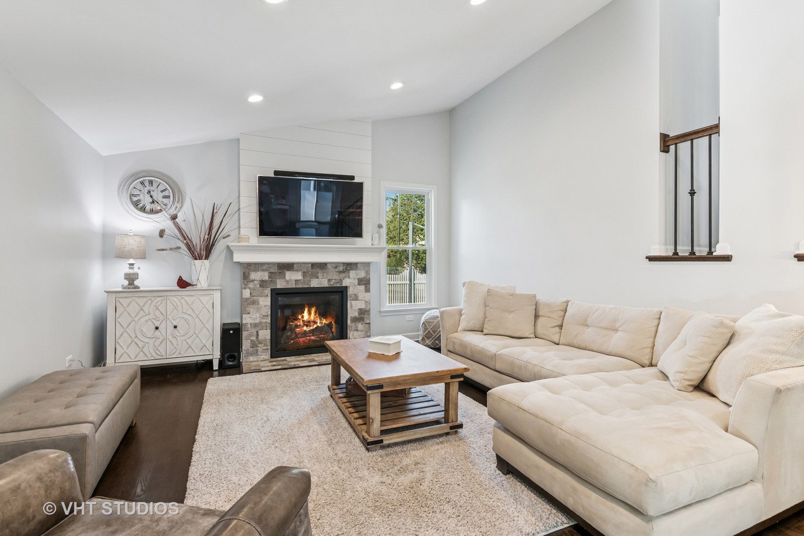 389 Weidner Road Buffalo Grove, IL 60089 - Photo 10 of 25 a living room with furniture and a fireplace