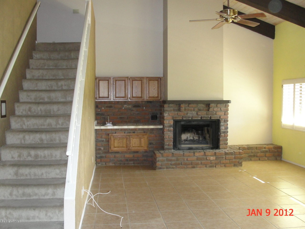 2329 North Recker Road, Unit 26 Mesa, AZ 85215 - Photo 4 of 14 Familyroom with fireplace