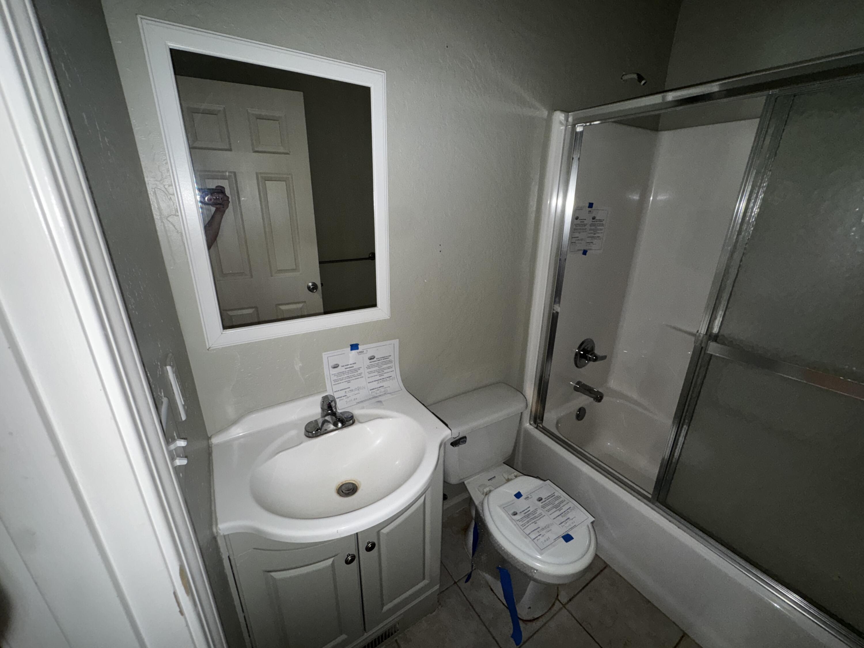 240 Bluff Street Butte Falls, OR 97522 - Photo 25 of 34 a bathroom with a sink a toilet and a mirror