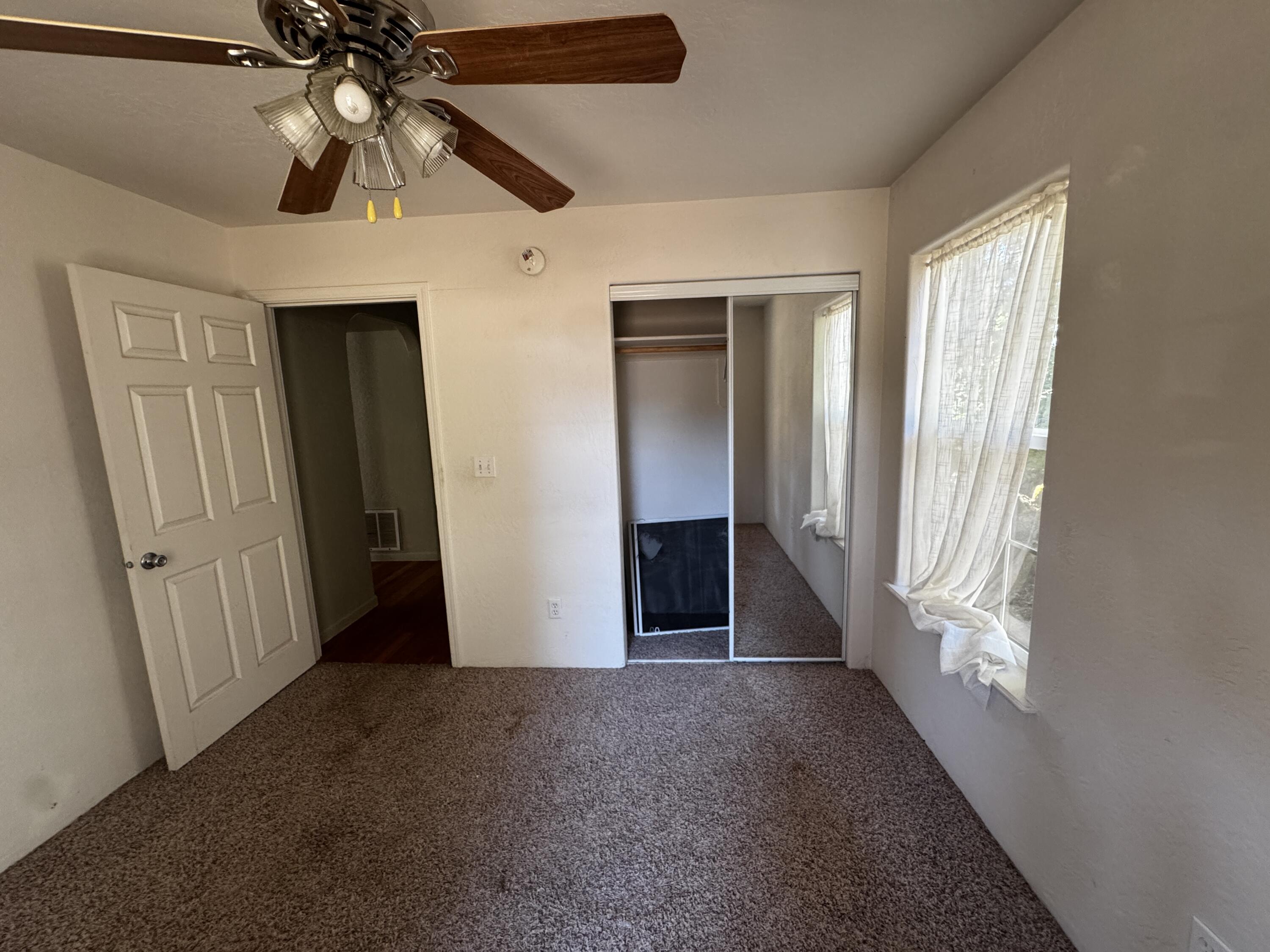 240 Bluff Street Butte Falls, OR 97522 - Photo 28 of 34 an empty room with windows and fan