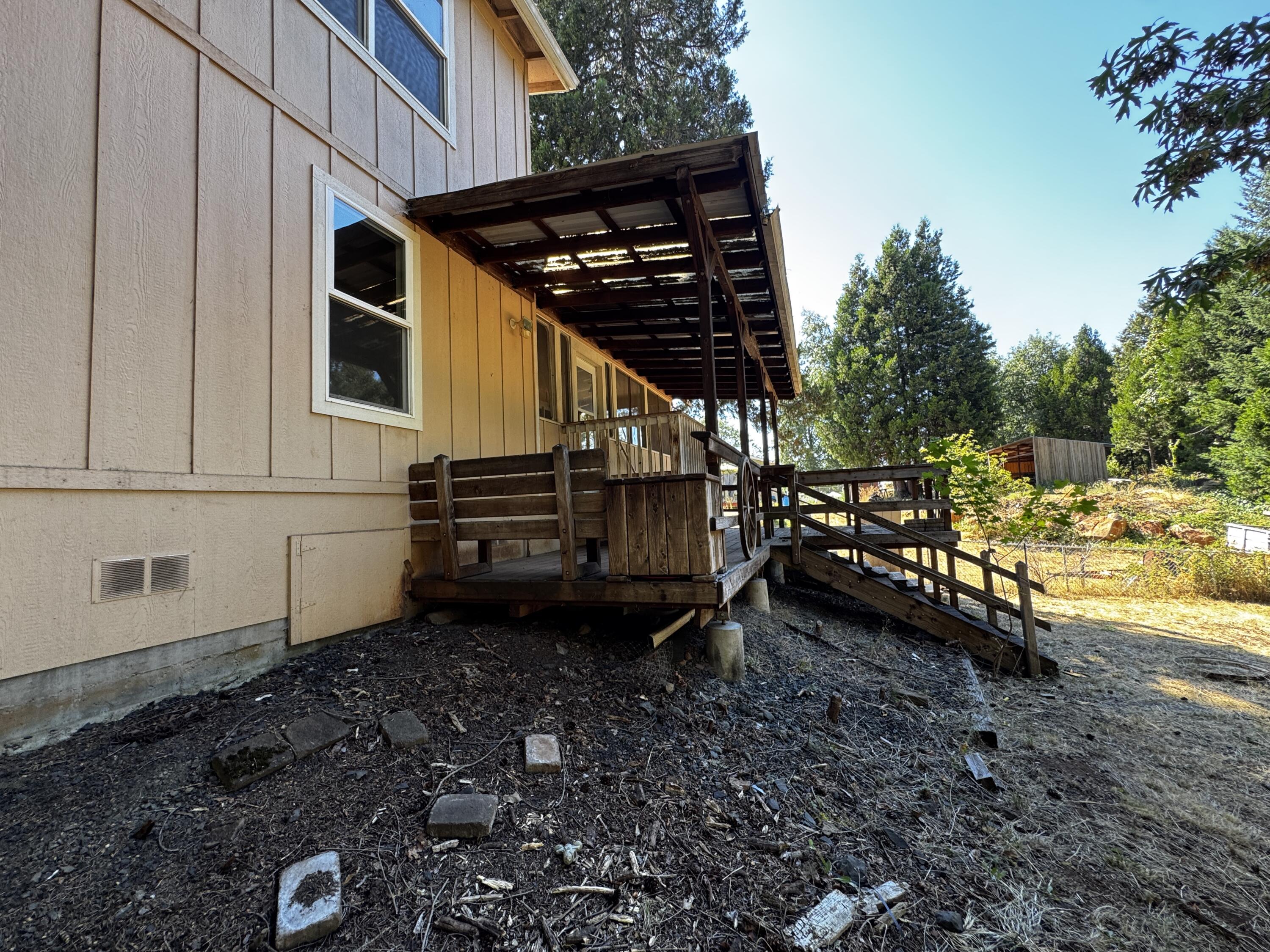 240 Bluff Street Butte Falls, OR 97522 - Photo 32 of 34 a view of a backyard with sitting area
