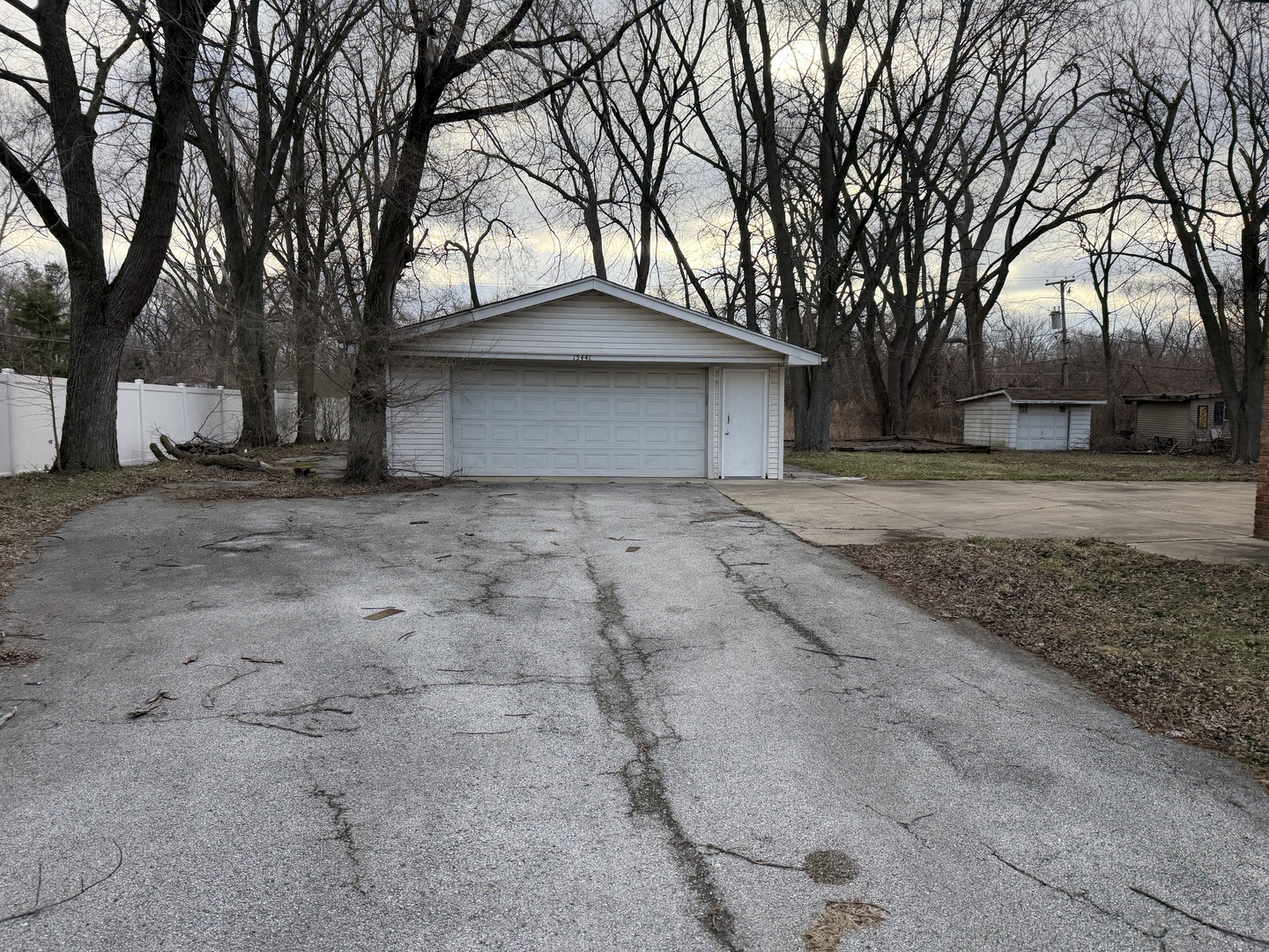 15441 East End Street Dolton, IL 60419 - Photo 5 of 16 a front view of a house with a yard