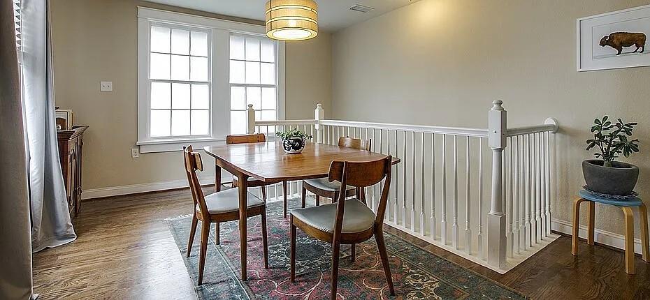 407 South Windomere Avenue, Unit A Dallas, TX 75208 - Photo 5 of 10 a view of a dining room with furniture and a window