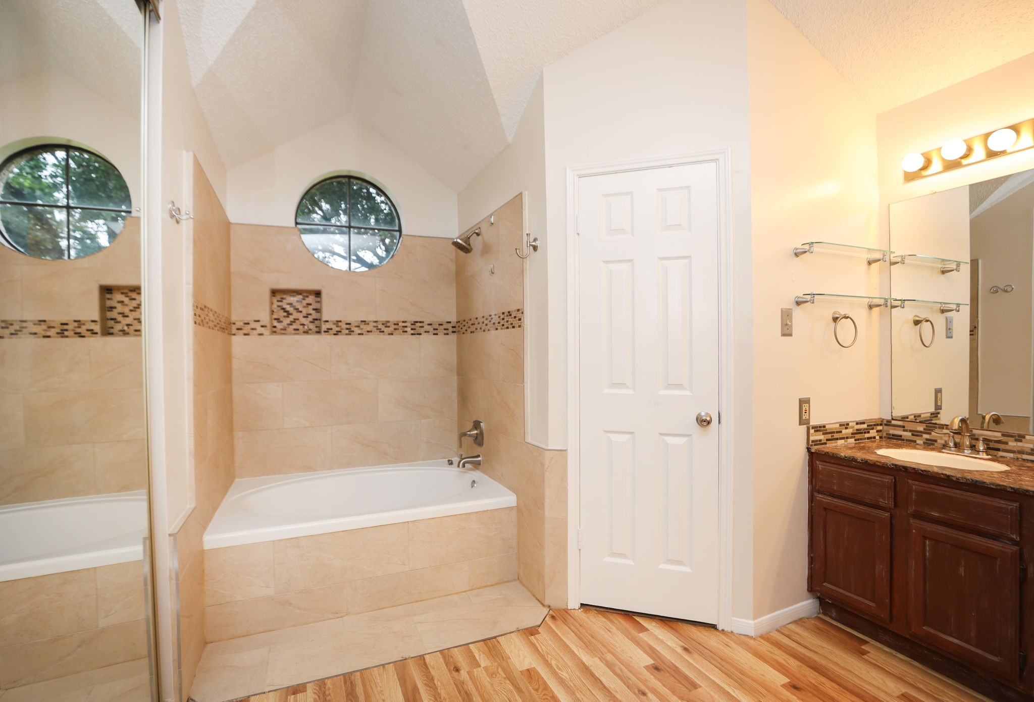 11947 Paddock Way Houston, TX 77065 - Photo 14 of 16 Updated shower and tub for primary bathroom.