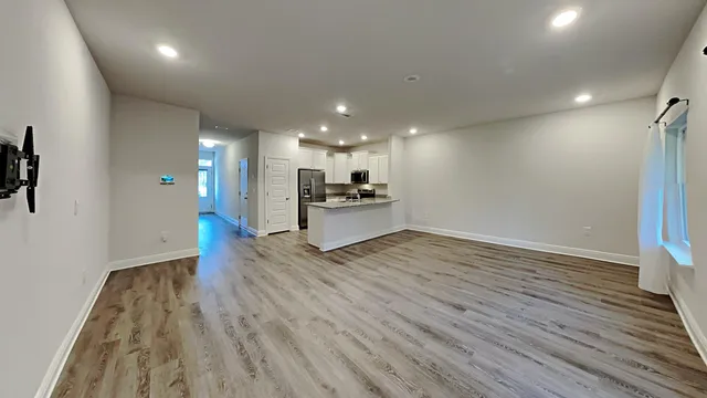 a view of a kitchen with a sink and dishwasher
