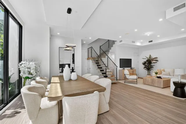 a view of kitchen with cabinets and wooden floor