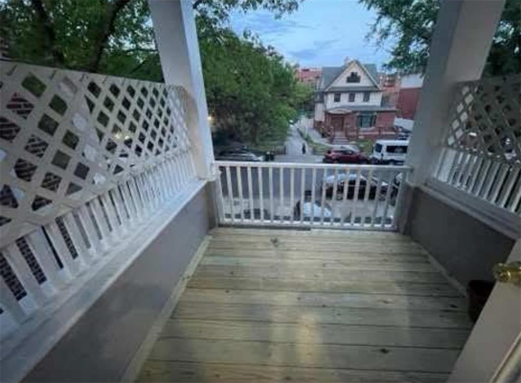 546 East 9th Street Brooklyn, NY 11218 - Photo 8 of 8 a view of balcony with wooden floor