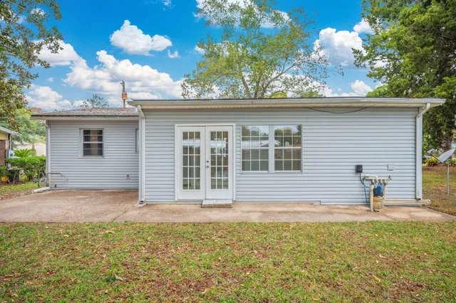 a house view with a garden space