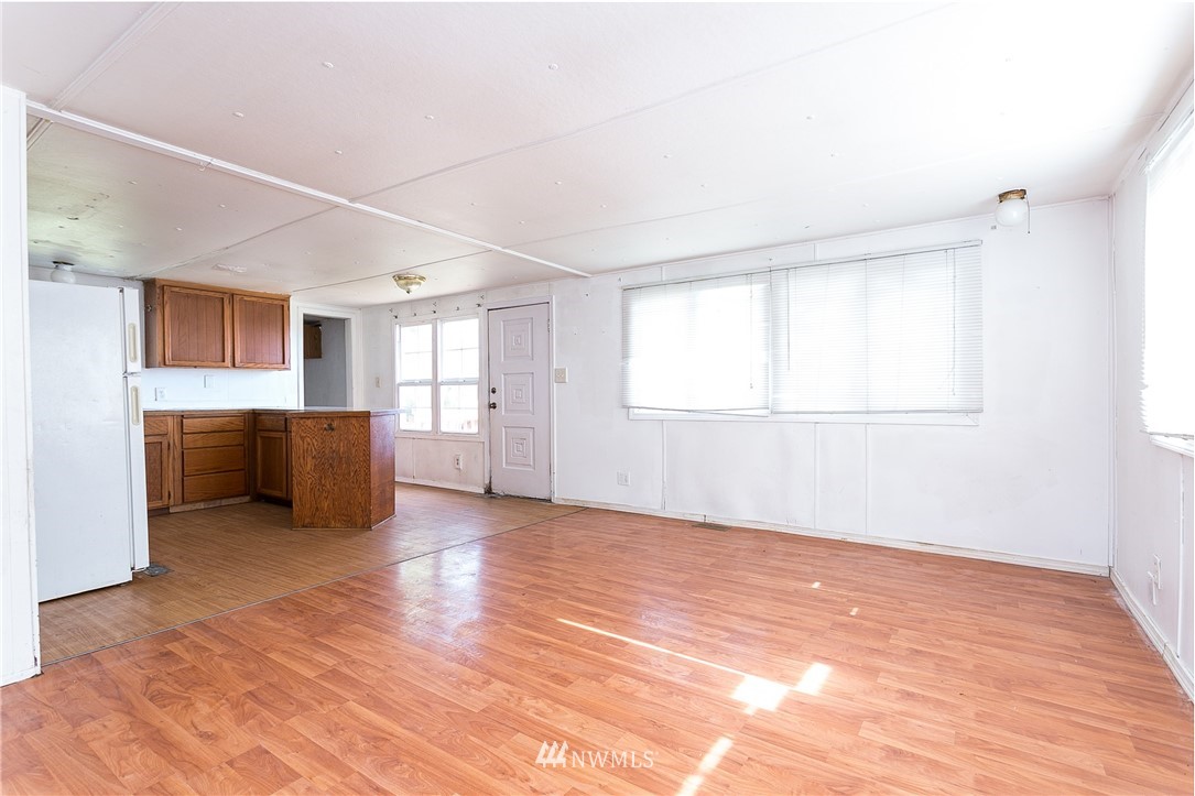 3676 North Red River Road Ferndale, WA 98248 - Photo 12 of 26 a view of an empty room with a window and wooden floor