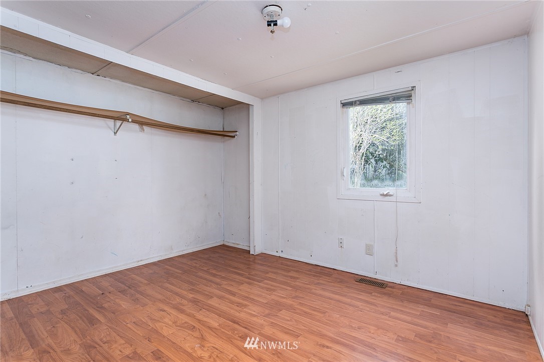 3676 North Red River Road Ferndale, WA 98248 - Photo 15 of 26 a view of empty room with wooden floor and fan