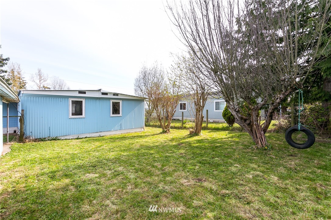 3676 North Red River Road Ferndale, WA 98248 - Photo 5 of 26 a view of a house with a yard and garage