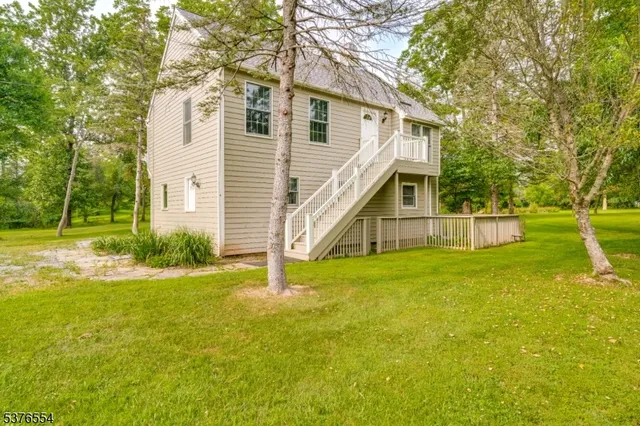 a view of a house with swimming pool