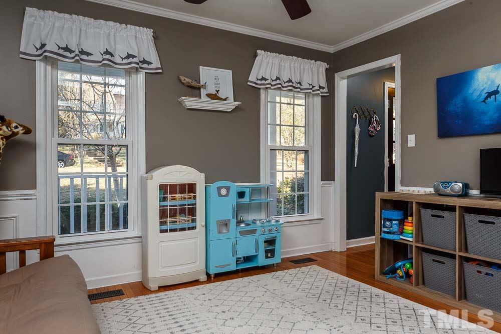 6932 Three Bridges Circle Raleigh, NC 27613 - Photo 11 of 25 a bedroom with furniture and a window