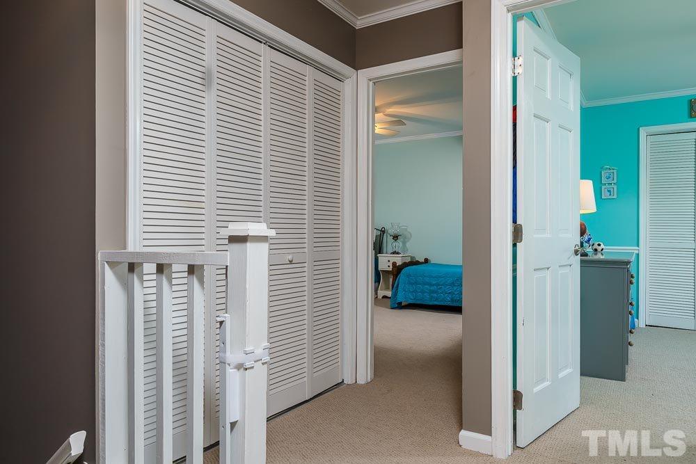 6932 Three Bridges Circle Raleigh, NC 27613 - Photo 15 of 25 a view of a livingroom and a balcony