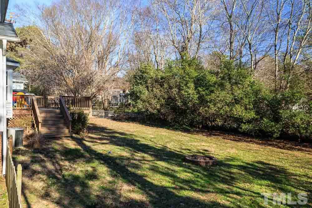 6932 Three Bridges Circle Raleigh, NC 27613 - Photo 22 of 25 a view of outdoor space with deck and yard