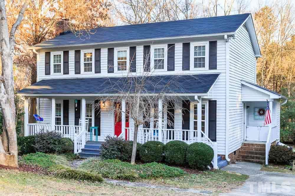 6932 Three Bridges Circle Raleigh, NC 27613 - Photo 24 of 25 a front view of a house with garden
