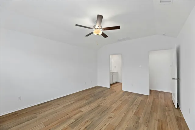 a white bath tub sitting next to a window