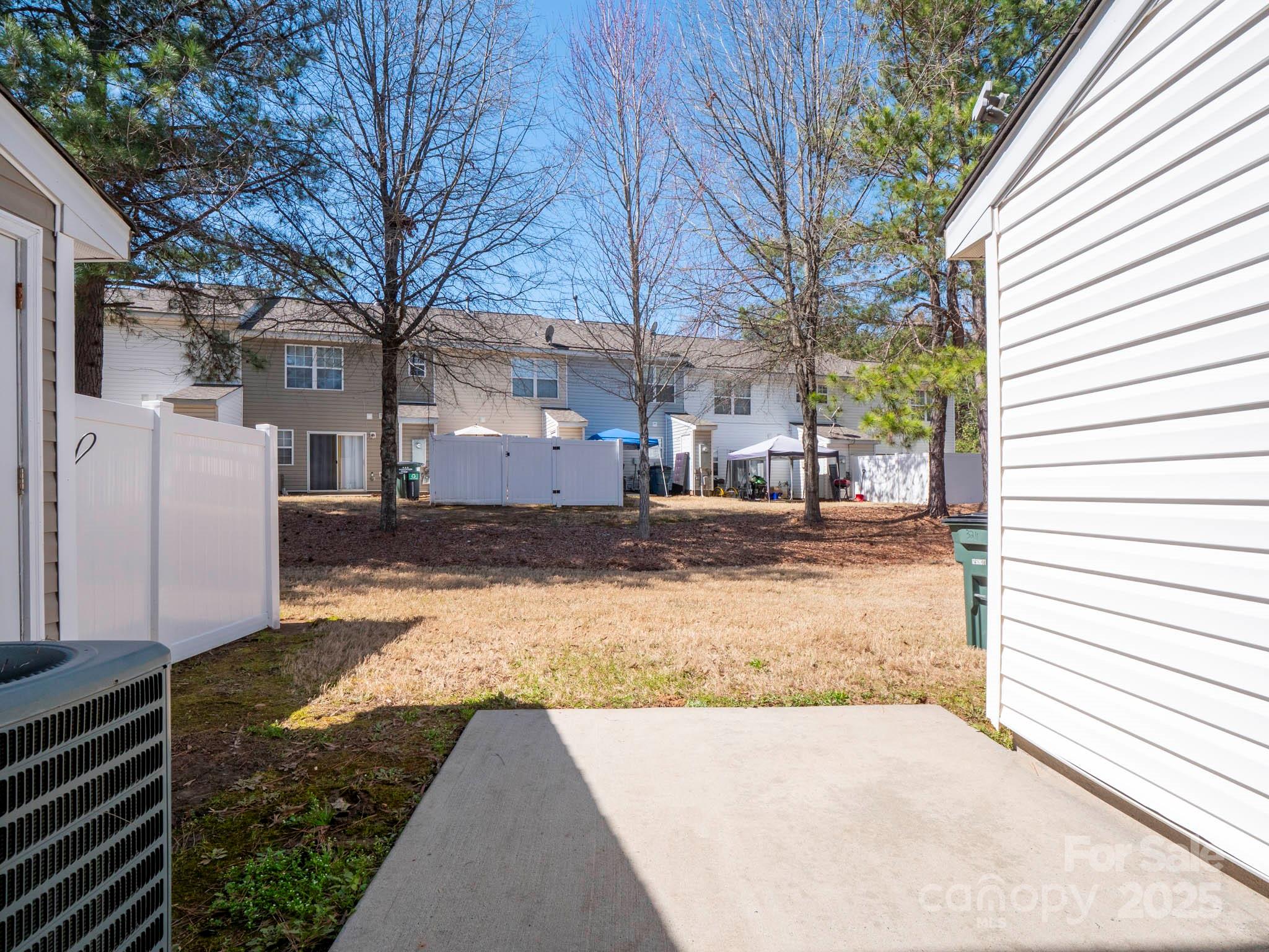 3209 Blythe Ridge Court Charlotte, NC 28213 - Photo 24 of 31 a view of a house with a yard