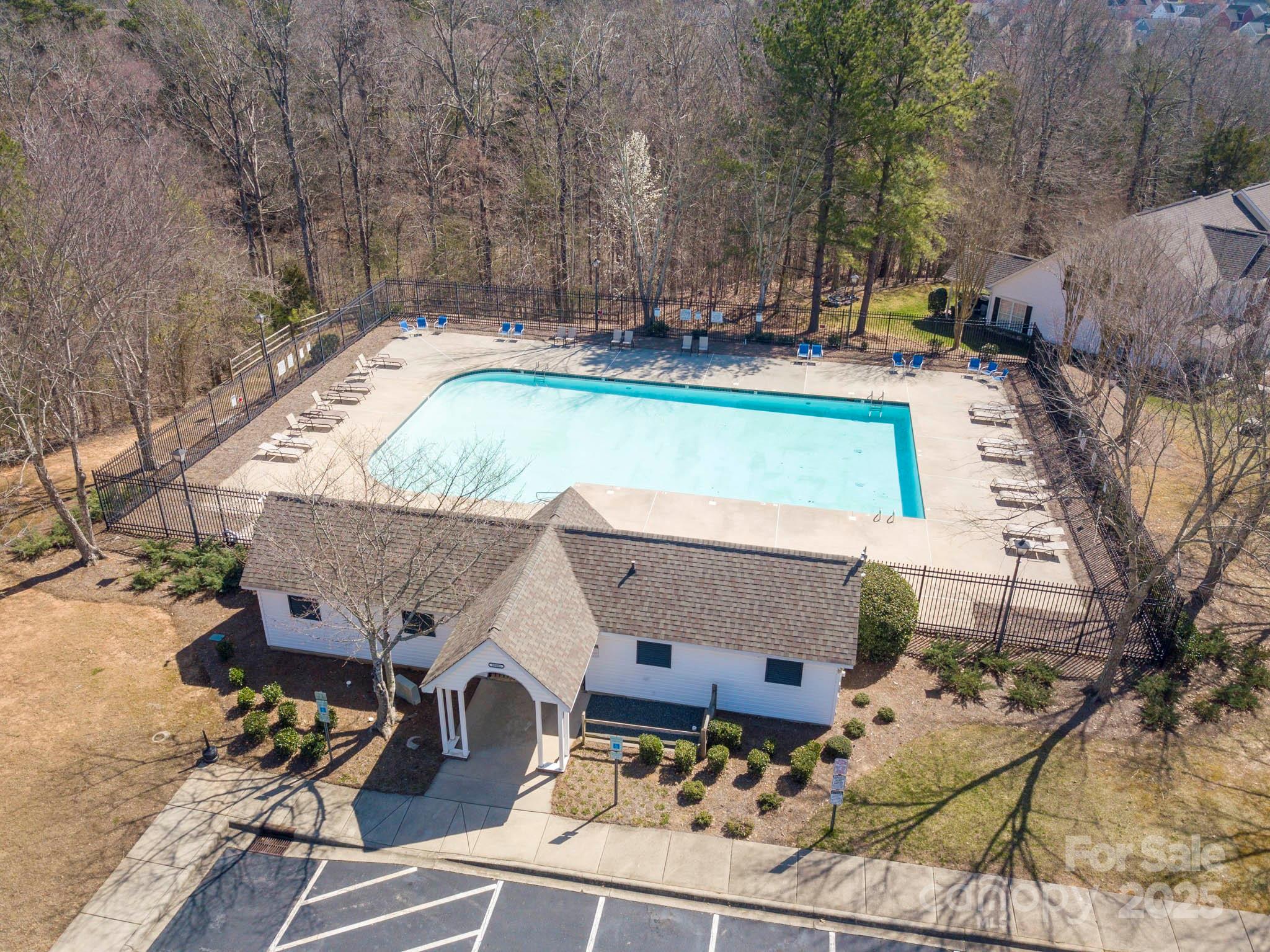 3209 Blythe Ridge Court Charlotte, NC 28213 - Photo 27 of 31 a view of a house with a yard and sitting area