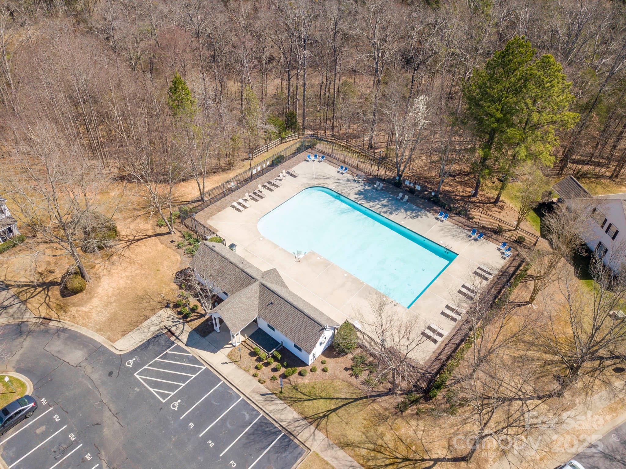 3209 Blythe Ridge Court Charlotte, NC 28213 - Photo 28 of 31 a view of a backyard with a tv