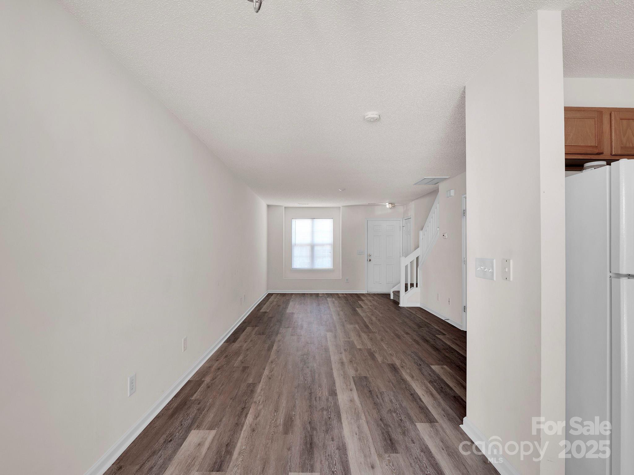 3209 Blythe Ridge Court Charlotte, NC 28213 - Photo 7 of 31 a view of wooden floor in a room