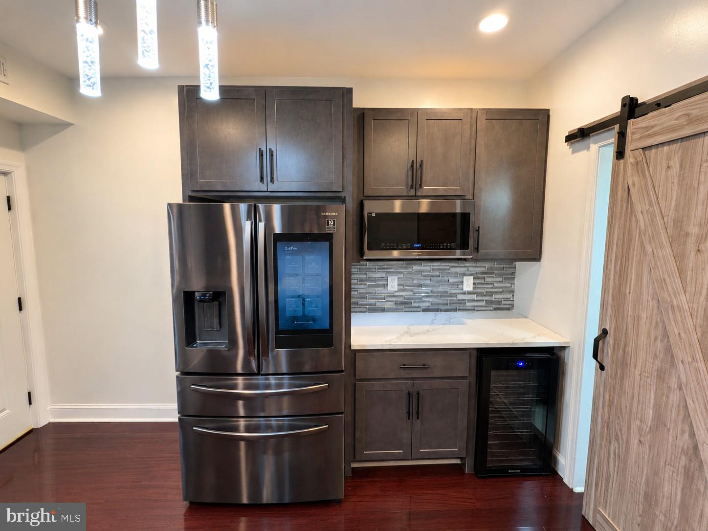 1610 Federal Street Baltimore, MD 21213 - Photo 6 of 27 Sleek modern kitchen with stylish finishes.