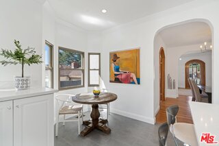 3034 Glen Avenue Altadena, CA 91001 - Photo 12 of 25 a view of a dining room with furniture and a potted plant