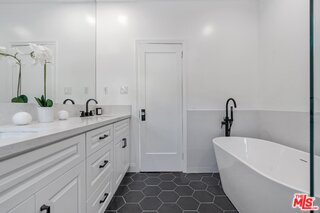 3034 Glen Avenue Altadena, CA 91001 - Photo 17 of 25 a bathroom with a double vanity sink mirror and bathtub