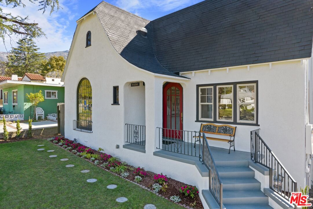 3034 Glen Avenue Altadena, CA 91001 - Photo 2 of 25 a front view of a house with garden