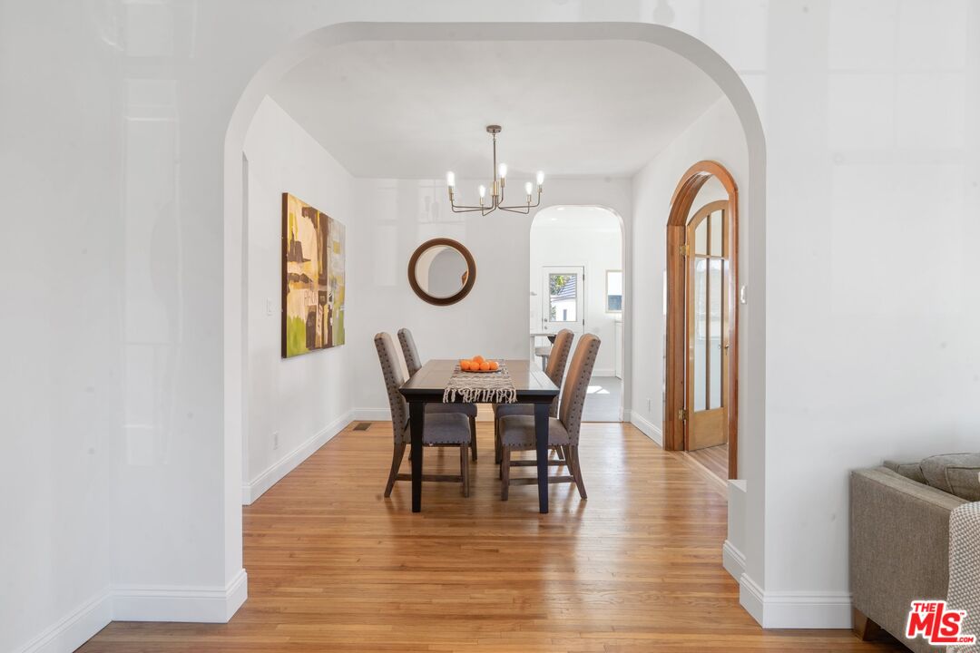 3034 Glen Avenue Altadena, CA 91001 - Photo 5 of 25 a view of a dining room with furniture and a chandelier