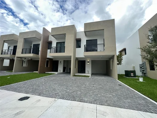 a view of house and outdoor space