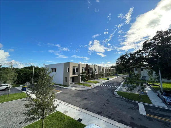 a view of a garden with patio