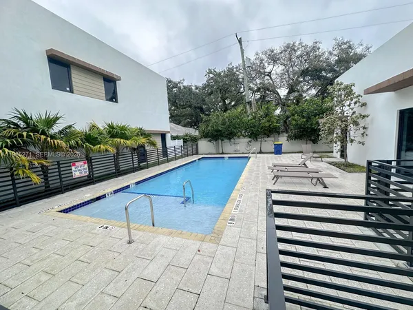 a view of a terrace with sitting area