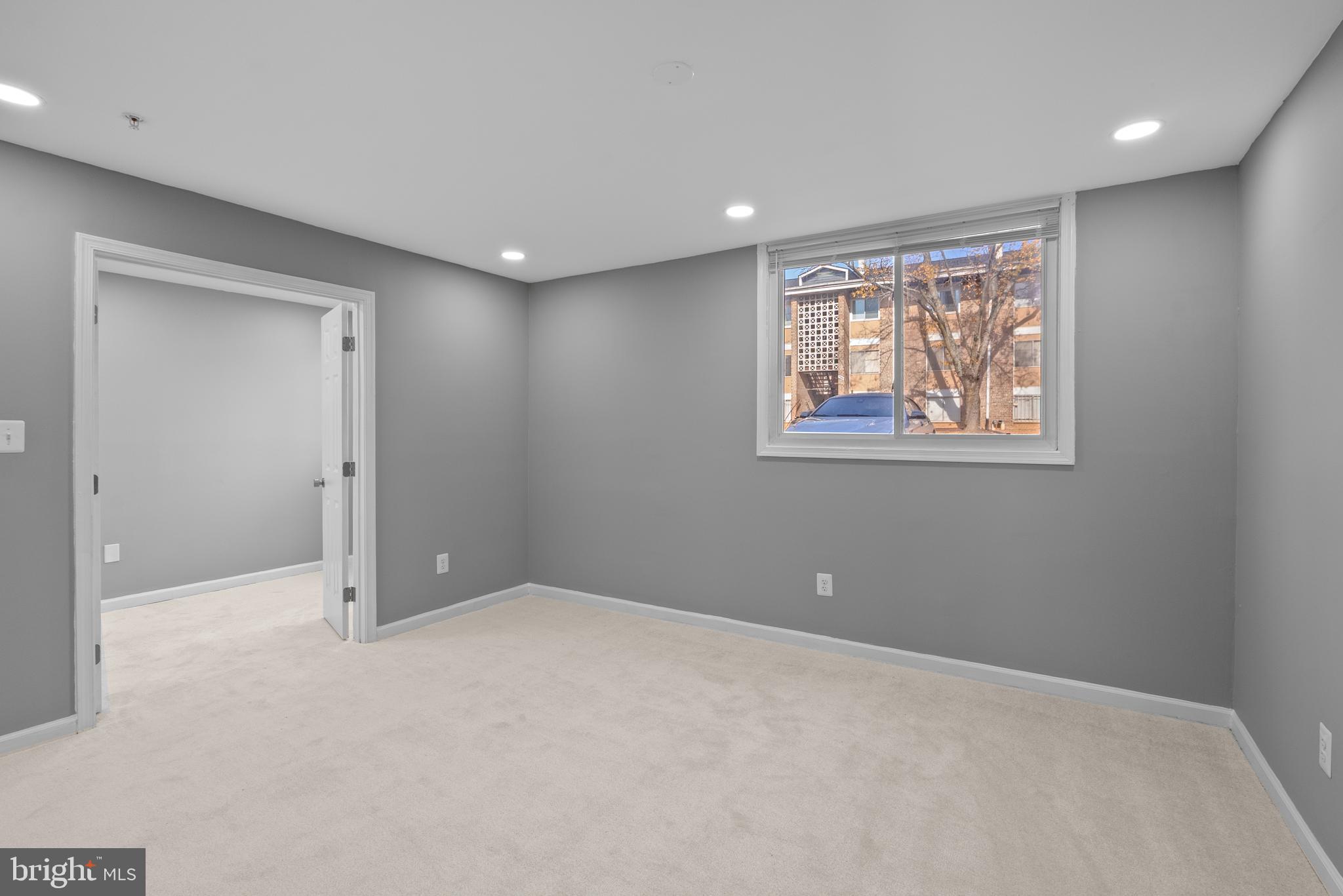 542 Wilson Bridge Drive, Unit 6743 B2 Oxon Hill, MD 20745 - Photo 13 of 27 a view of an empty room with windows and closet