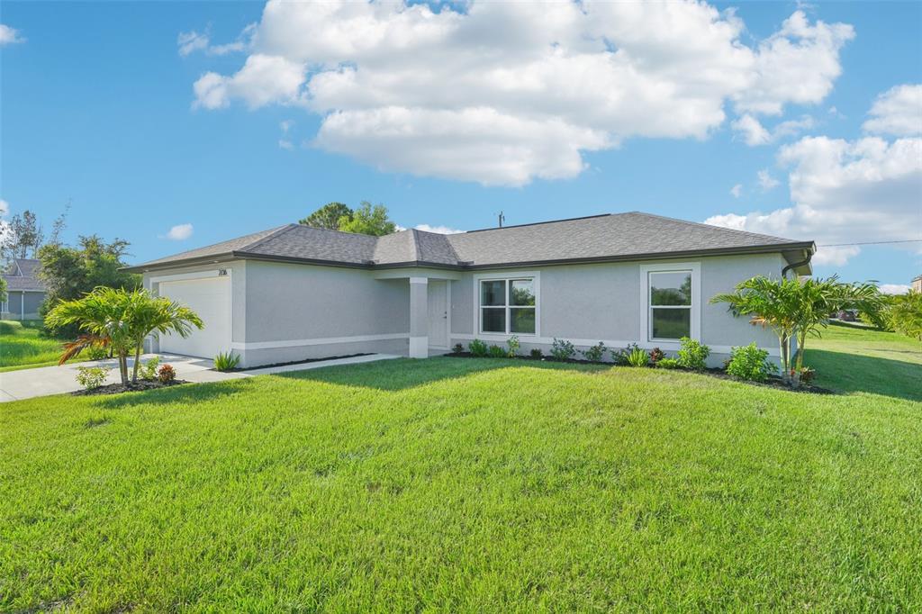 26384 Flower Road Punta Gorda, FL 33955 - Photo 1 of 1 a view of a house with backyard and garden